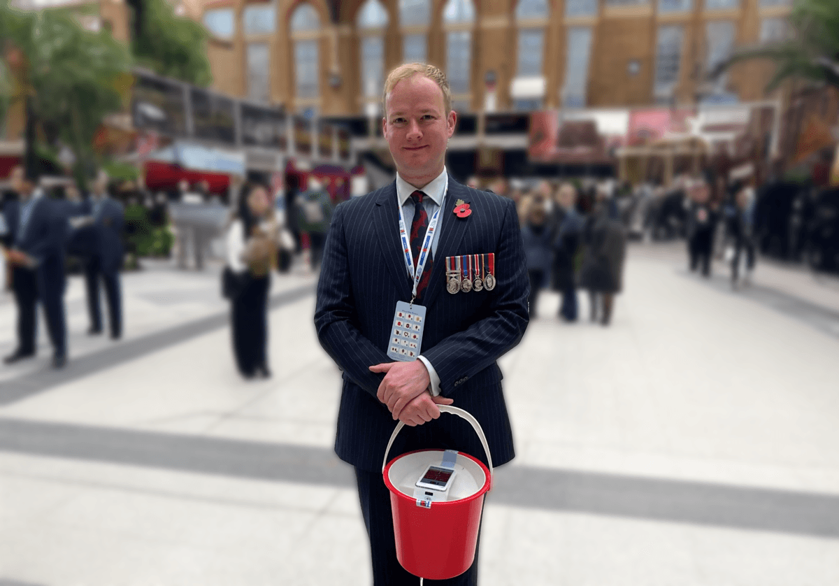 Image of Jack Barker selling poppies