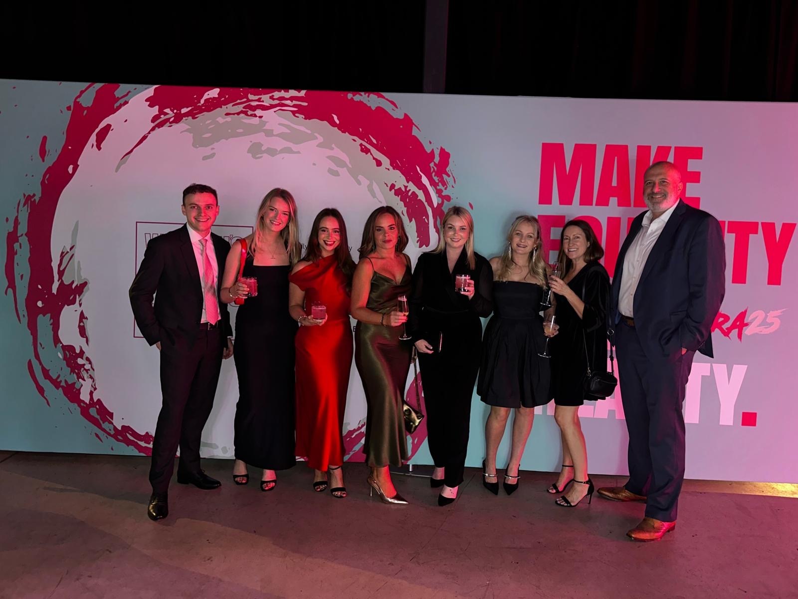 Group of people in cocktail attire