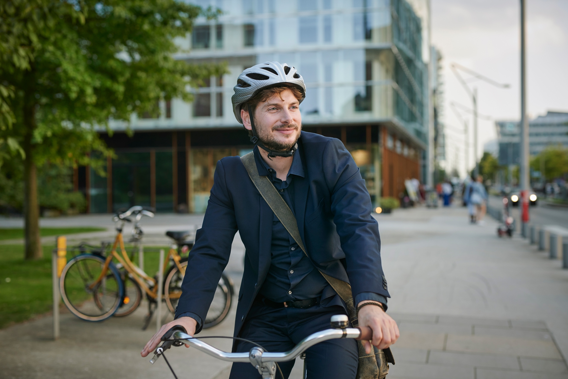 Happy young man on bicycle