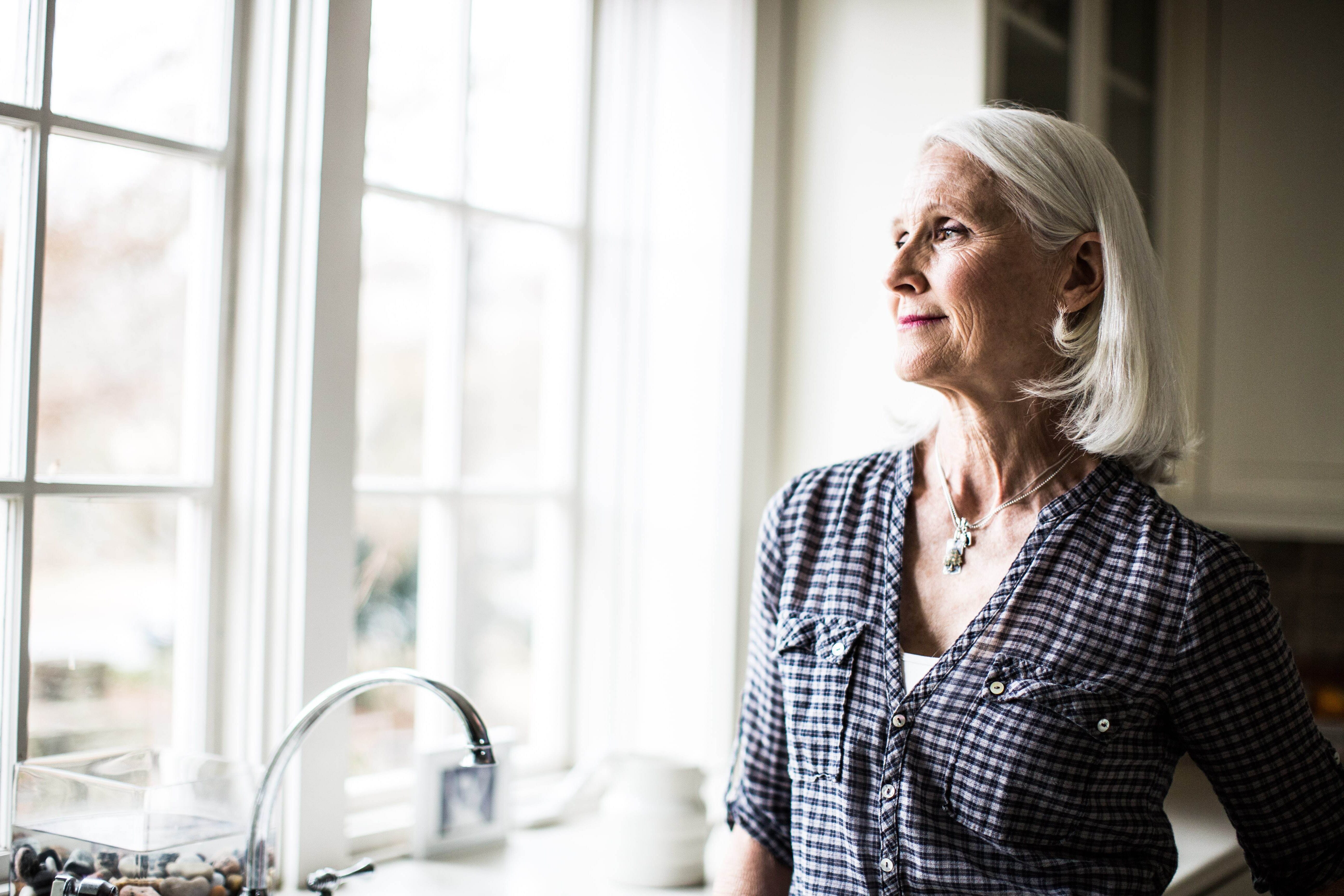 Portrait of senior woman in kitchen